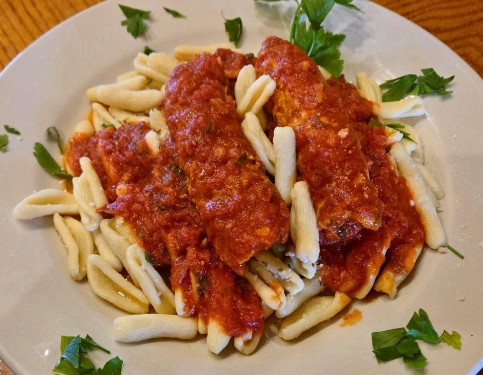 Mama Rosina’s famous pork braciola and cavatelli that’s stuffed with Italian spices before being slowly simmered in red tomato sauce and placed over cavatelli.
