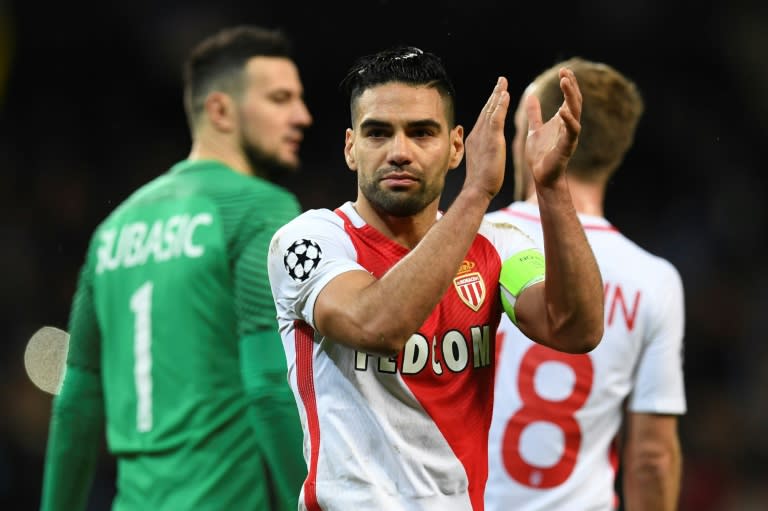 Monaco's Radamel Falcao applauds at the end of their UEFA Champions League round of 16 1st leg match against Manchester City, at the Etihad Stadium in Manchester, on February 21, 2017