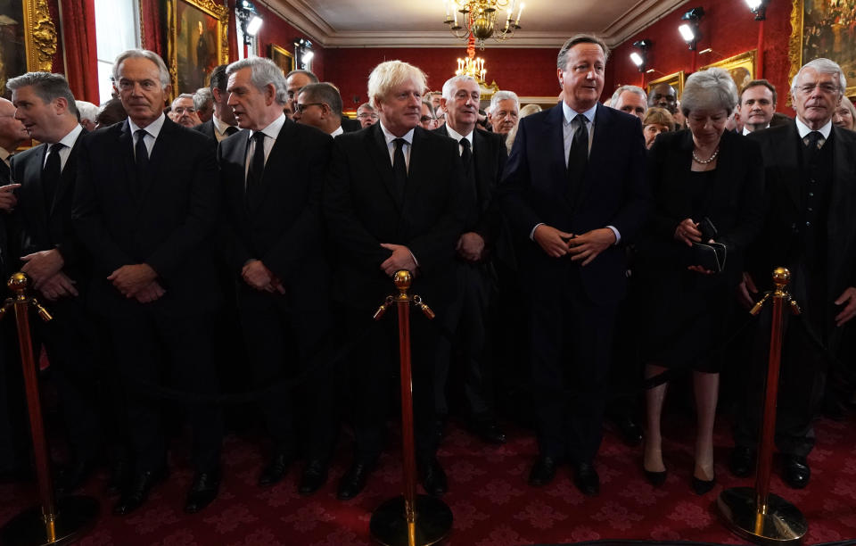 Labour leader Keir Starmer (L), former British Prime ministers Tony Blair (2L), Gordon Brown (3L), Boris Johnson (C), David Cameron (4R), Theresa May (3R) and John Major (2R) gather ahead of the Accession Council ceremony inside St James's Palace in London on September 10, 2022, to proclaim King Charles III as the new King.