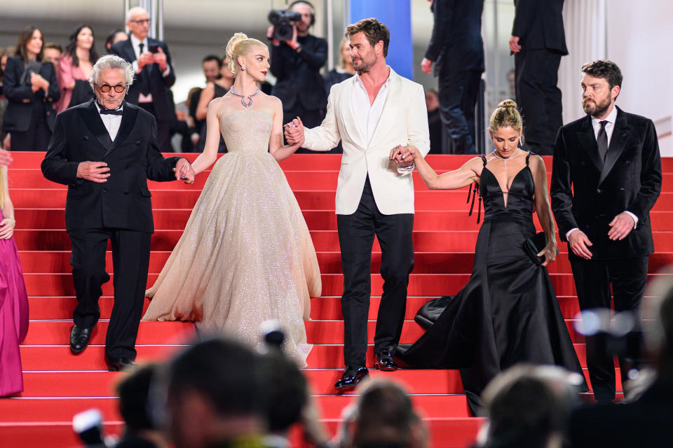 CANNES, FRANCE - MAY 15: George Miller, Anya Taylor-Joy, Chris Hemsworth and Elsa Pataky depart the 