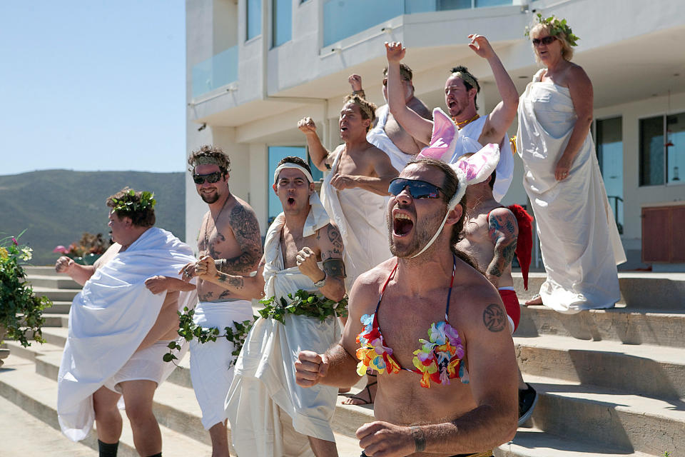 The crew of Jackass at a toga party