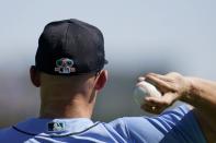 Seattle Mariners' Kyle Seager warms up prior to a spring training baseball game against the Cleveland Indians Monday, March 8, 2021, in Goodyear, Ariz. (AP Photo/Ross D. Franklin)