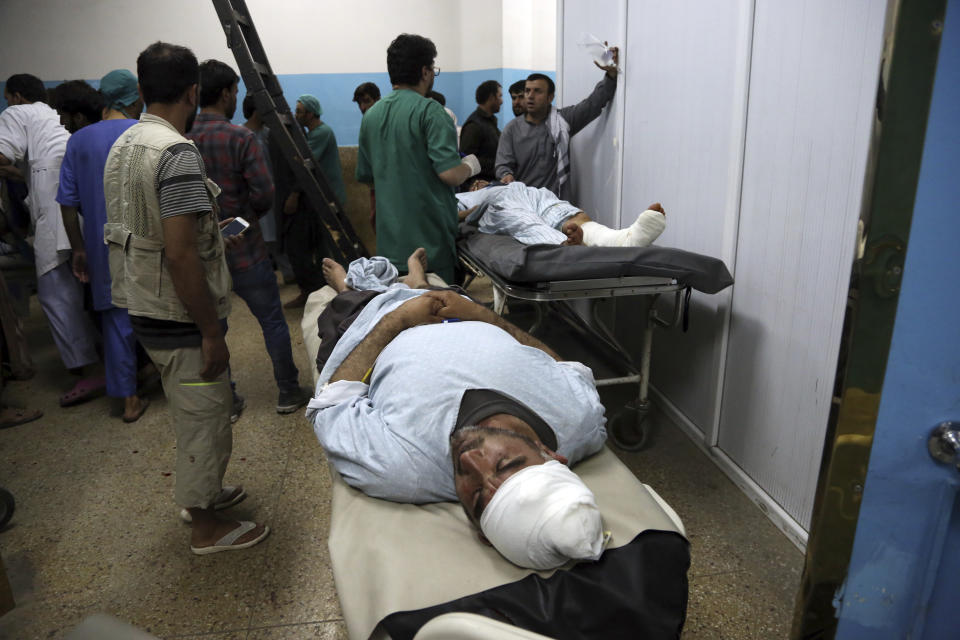 Wounded men receive treatment in a hospital, after a large explosion in Kabul, Afghanistan, Monday, Sept. 2, 2019. The Taliban claimed responsibility for a large explosion in the Afghan capital Monday night, which government officials said targeted an area home to several international organizations and guesthouses. (AP Photo/Rahmat Gul)