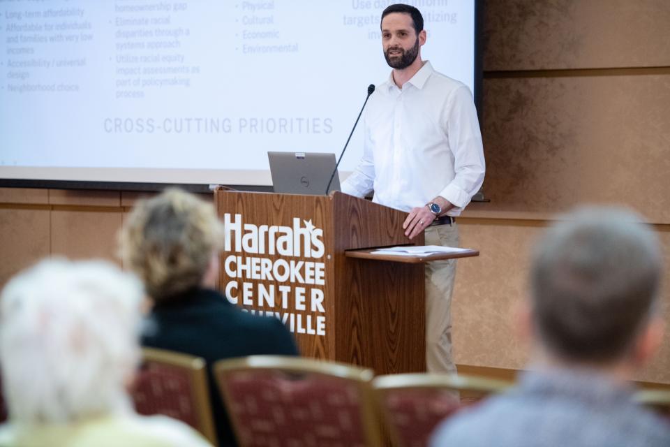 Jerah Smith, a program director of Equitable Housing Solutions with Enterprise, speaks during a meeting on affordable housing at Harrah’s Cherokee Center Asheville, March 27, 2024.