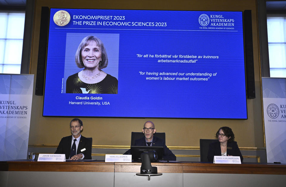 From left Jakob Svensson, chairman of the Royal Swedish Academy of Sciences, Hans Ellegren, permanent secretary Royal Academy of Sciences and Randi Hjalmarsson, member of the committee for the prize in economic science in memory of Alfred Nobel announce the Nobel Prize in Economics, in Stockholm, Monday, Oct. 9, 2023. The Nobel economics prize has been awarded to Claudia Goldin, a professor at Harvard University, for advancing understanding of women’s labor market outcomes. Hans Ellegren, secretary-general of the Royal Swedish Academy of Sciences, announced the award Monday in Stockholm. (Claudio Bresciani /TT News Agency via AP)