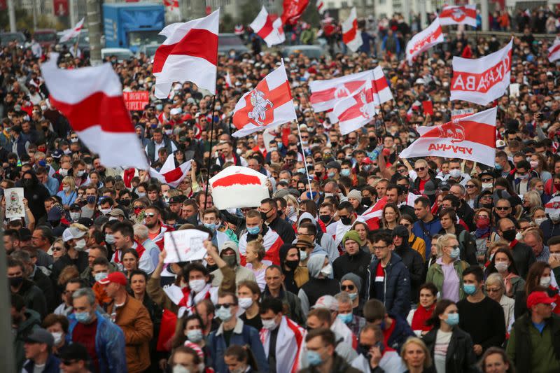 Belarusian opposition supporters hold a rally in Minsk