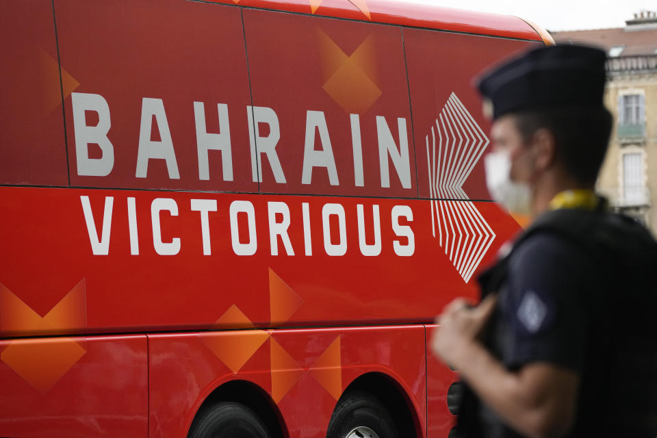 The Bahrain Victorious team bus is parked prior to the eighteenth stage of the Tour de France cycling race over 129.7 kilometers (80.6 miles) with start in Pau and finish in Luz Ardiden, France,Thursday, July 15, 2021. The Bahrain Victorious team competing at the Tour de France says it was raided by French police on the eve of Thursday's stage. (AP Photo/Christophe Ena)