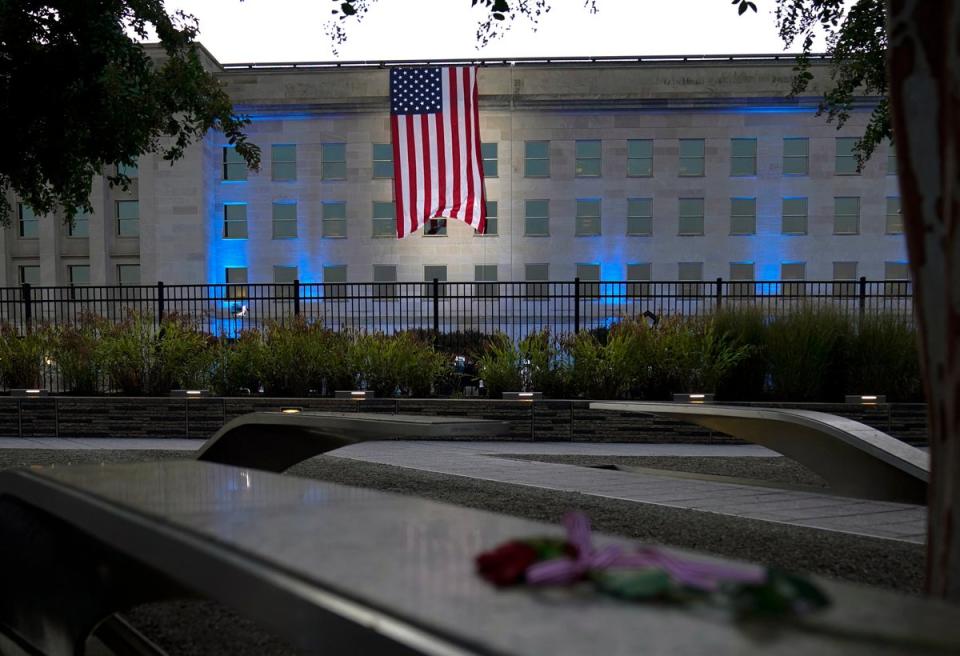 An American flag is unveiled at the Pentagon on the morning of September 11 (Associated Press)