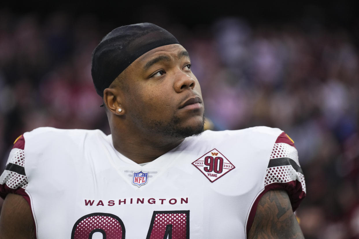 HOUSTON, TX - NOVEMBER 20: Daron Payne #94 of the Washington Commanders stands during the national anthem against the Houston Texans at NRG Stadium on November 20, 2022 in Houston, Texas. (Photo by Cooper Neill/Getty Images)