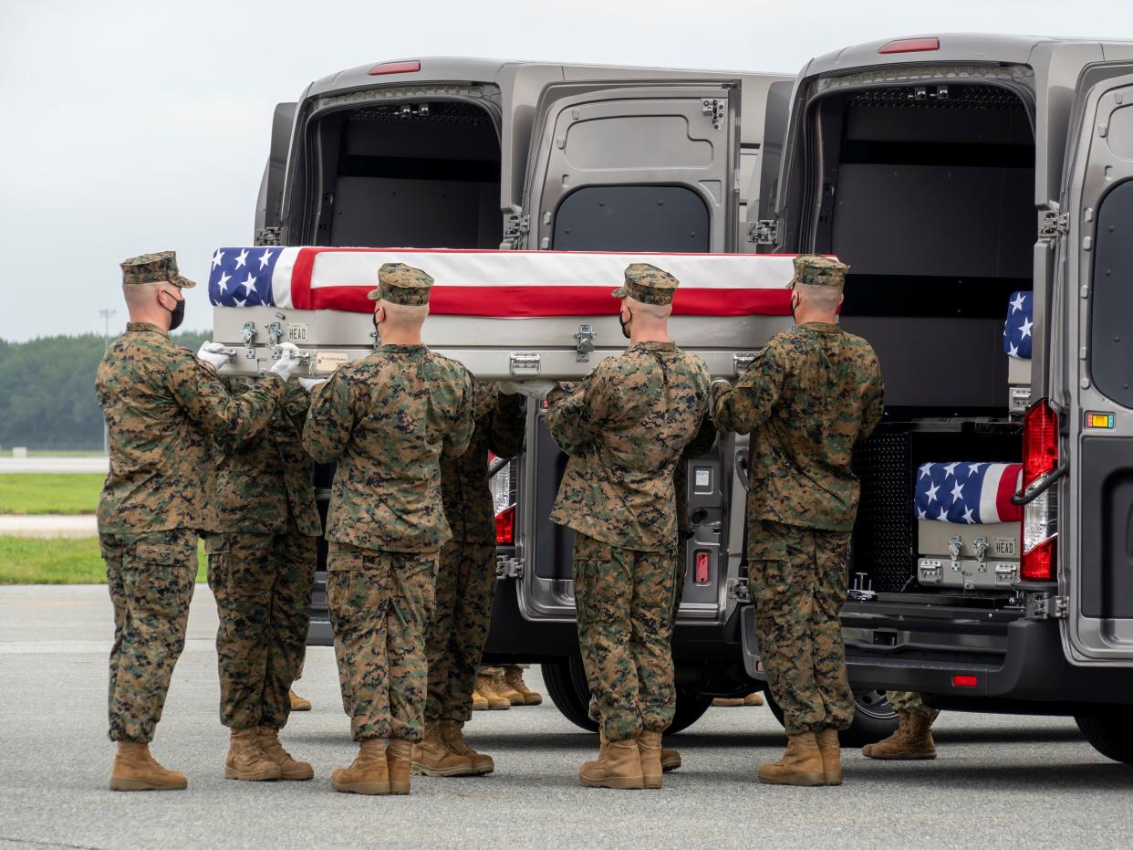 A US Marine Corps carry team transfers the remains of Marine Corps Lance Cpl. Kareem M. Nikoui of Norco, California, Aug. 29, 2021 at Dover Air Force Base, Delaware (Getty Images)