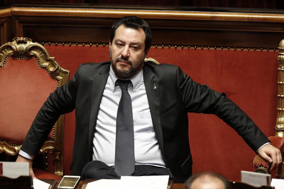 In this picture taken Saturday, Dec. 22, 2018, Italian Interior Minister Matteo Salvini waits for the start of a confidence vote on the budget law at the Italian Senate in Rome. (Riccardo Antimiani/ANSA Via AP)