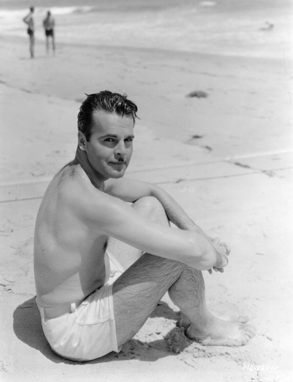 <p>Neil Hamilton, star of <em>The Great Gatsby</em>, poses for a beach photo outside his Malibu cottage, circa 1926.</p>