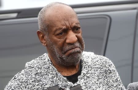 FILE PHOTO: Actor and comedian Bill Cosby arrives for his arraignment on sexual assault charges at the Montgomery County Courthouse in Elkins Park, Pennsylvania, U.S., on December 30, 2015. REUTERS/Mark Makela/File Photo