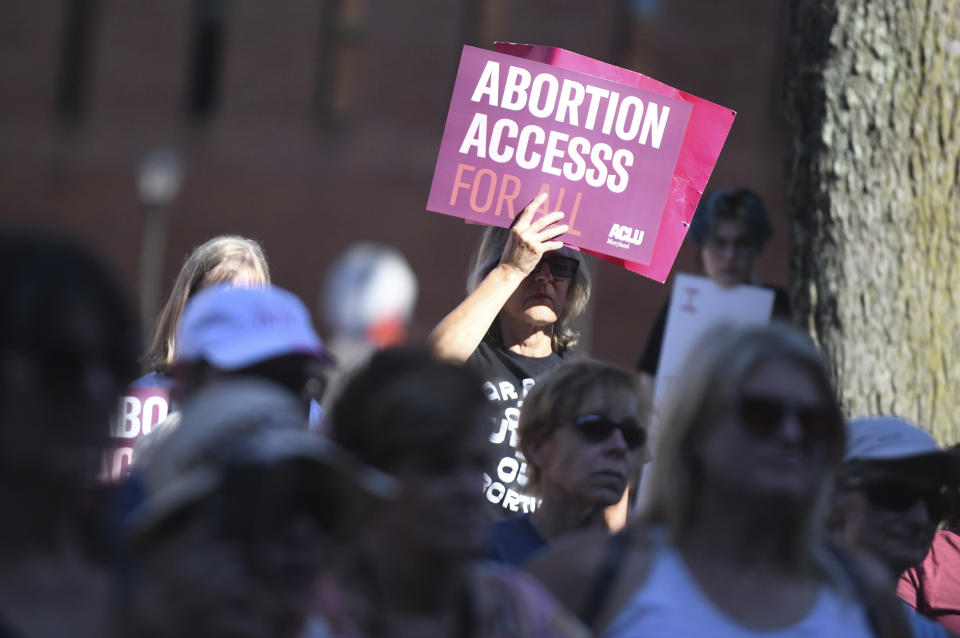 FILE - A woman holds a sign while joined by other supporters during an abortion rights rally in The People's Park in Annapolis, Md., June 24, 2022. In 2024, Maryland voters will decide whether to enshrine the right to abortion in the state's constitution, after the House of Delegates voted Thursday, March 30, 2023, to put a constitutional amendment on the ballot. (Brian Krista/The Baltimore Sun via AP, File)