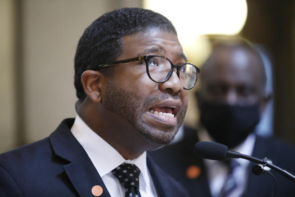 Rev. C.J. Rhodes, pastor of Mt. Helm Baptist Church, makes an impassioned plea for a change in the Mississippi state flag, Thursday, June 25, 2020, during a news conference at the Capitol in Jackson, Miss. A large number of Black pastors lobbied their legislators, calling on them to strike the current flag. The current flag has in the canton portion of the banner the design of the Civil War-era Confederate battle flag, that has been the center of a long-simmering debate about its removal or replacement. (AP Photo/Rogelio V. Solis)