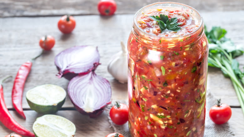 jar of salsa with ingredients