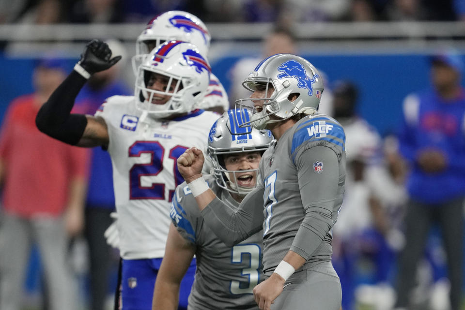 Detroit Lions punter Jack Fox (3) cheers as place kicker Michael Badgley ties the game during the second half of an NFL football game against the Buffalo Bills, Thursday, Nov. 24, 2022, in Detroit. (AP Photo/Paul Sancya)