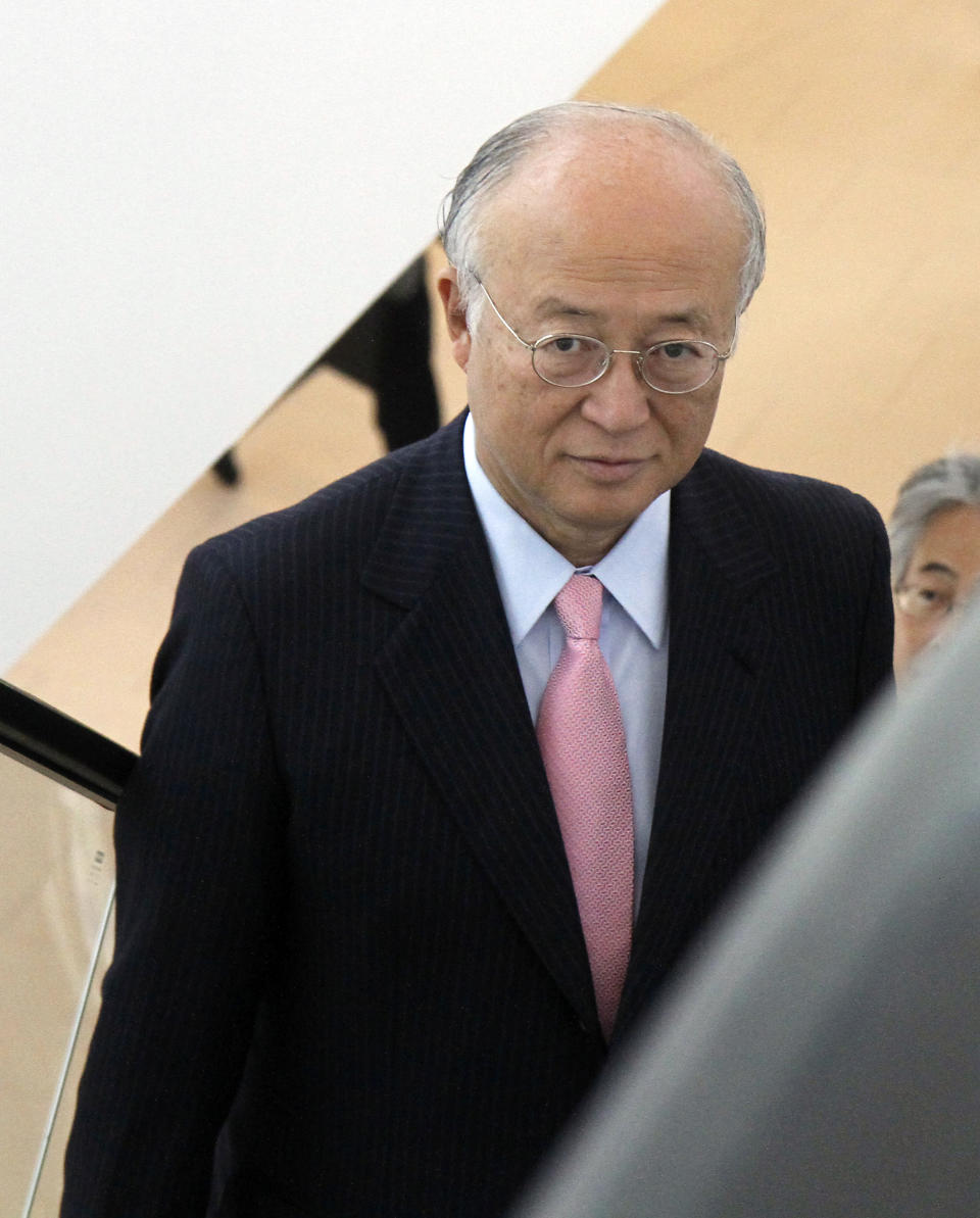 Director General of the International Atomic Energy Agency, IAEA, Yukiya Amano from Japan arrives for the IAEA board of governors meeting at the International Center, in Vienna, Austria, on Wednesday, June 6, 2012. (AP Photo/Ronald Zak)