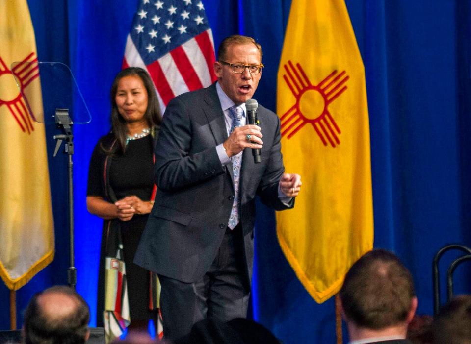 New Mexico state auditor-elect Brian Colón, right, delivers his acceptance speech in Albuquerque, N.M., Nov. 6, 2018. Colón is running against Albuquerque-based District Attorney Raúl Torrez for the Democratic endorsement to succeed termed-out Democratic Attorney General Hector Balderas.