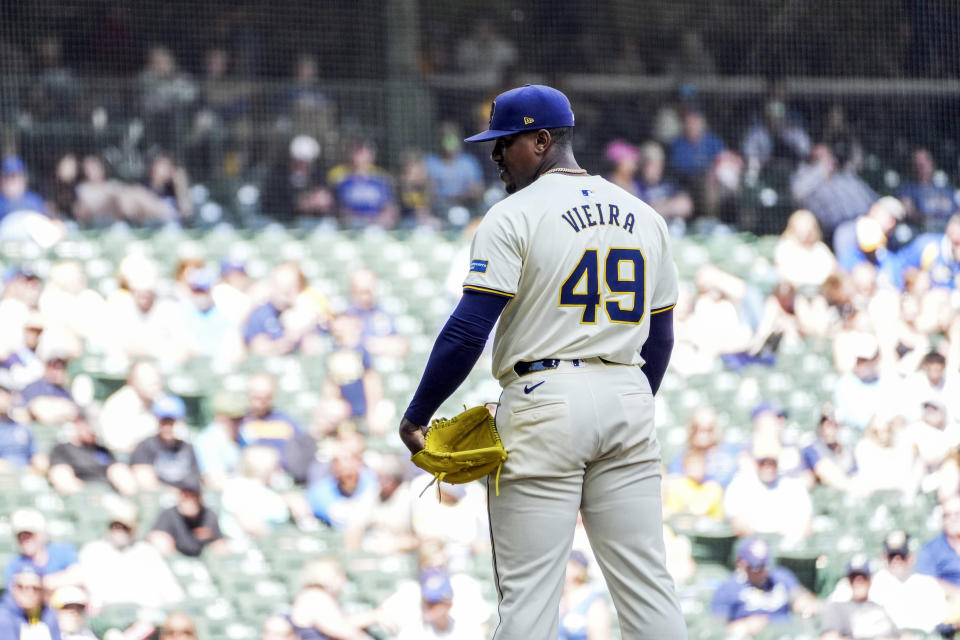 Milwaukee Brewers' Thyago Vieira gets set to pitch against the Tampa Bay Rays during the ninth inning of a baseball game Wednesday, May 1, 2024, in Milwaukee. (AP Photo/Kenny Yoo)