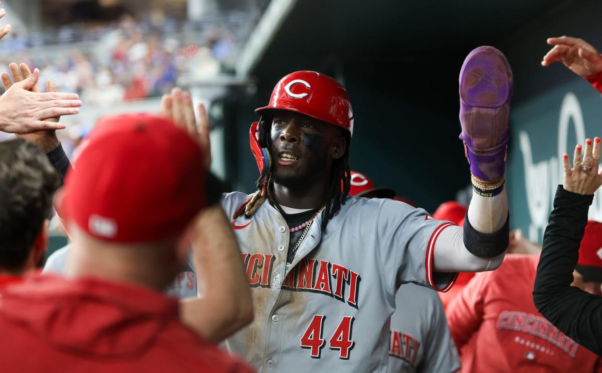 Elly De La Cruz celebrates after scoring in the first inning Friday on a steal of home on a first-and-third double steal. It turned out to be the Reds' only run of the game in the 2-1 loss.