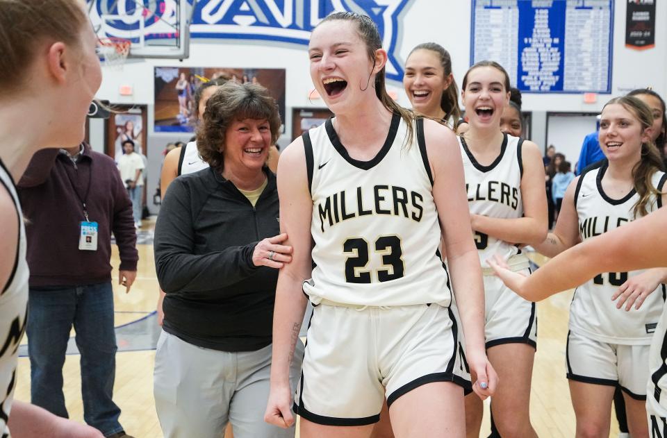 Noblesville Millers guard Meredith Tippner (23) yells in excitement Saturday, Feb. 3, 2024, during the IHSAA girls basketball sectional Class 4A game at Hamilton Southeastern High School in Indianapolis. The Noblesville Millers defeated the Hamilton Southeastern Royals, 49-45.