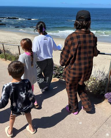 Kourtney Kardashian/Instagram Kourtney Kardashian on a walk with her three kids