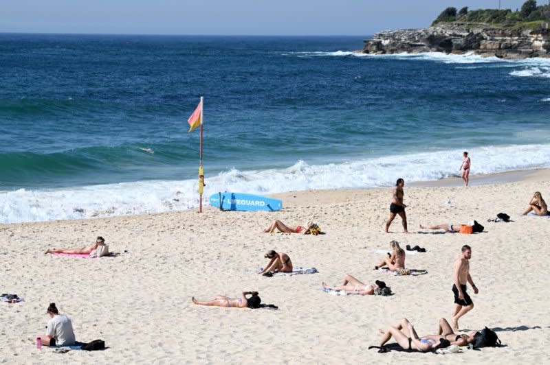 Beachgoers visit Coogee Beach in Sydney, Australia on September 19 as the country swelters through another day of spring heatwave conditions, with temperatures climbing into the mid to high 30s Celsius across several states. File Photo by Dan Himbrechts/EPA-EFE