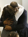 Former Dallas Cowboys NFL football player Josh Brent gets a hug from family after closing arguments in his intoxication manslaughter trial Tuesday, Jan. 21, 2014, in Dallas. The jury has begun deliberating in Brent's intoxication manslaughter trial after lawyers wrapped up their closing arguments Tuesday morning. Prosecutors accuse the former defensive tackle of drunkenly crashing his Mercedes near Dallas during a night out in December 2012, killing his good friend and teammate, Jerry Brown. (AP Photo/LM Otero)