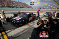 HOMESTEAD, FL - NOVEMBER 20: Cole Whitt, driver of the #84 Red Bull Racing Team Toyota, pits during the NASCAR Sprint Cup Series Ford 400 at Homestead-Miami Speedway on November 20, 2011 in Homestead, Florida. (Photo by Chris Graythen/Getty Images)