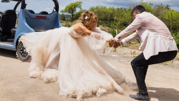 Jennifer Lopez and Josh Duhamel in "Shotgun Wedding"<p>Amazon Studios</p>
