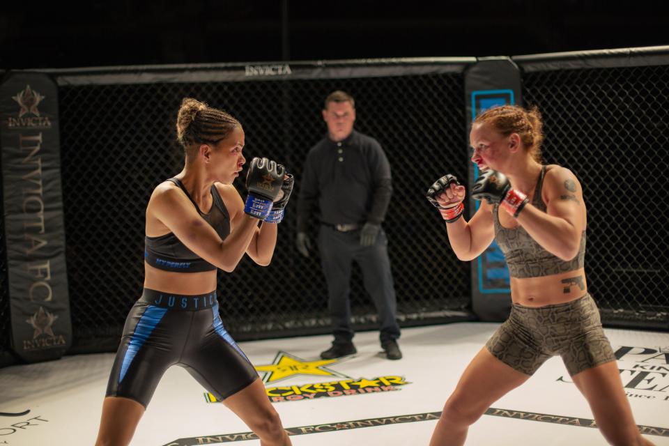 In her directorial debut, Halle Berry (left, with Valentina Shevchenko) also stars as a disgraced MMA fighter who finds redemption in the cage in "Bruised."