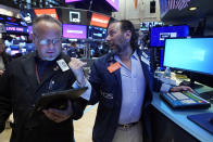 Trader Robert Arciero, left, and specialist Michael Pistillo work on the floor of the New York Stock Exchange, Wednesday, Aug. 30, 2023. Stocks are edging mostly higher in early trading on Wall Street chipping a bit more away from the market's losses in August. (AP Photo/Richard Drew)