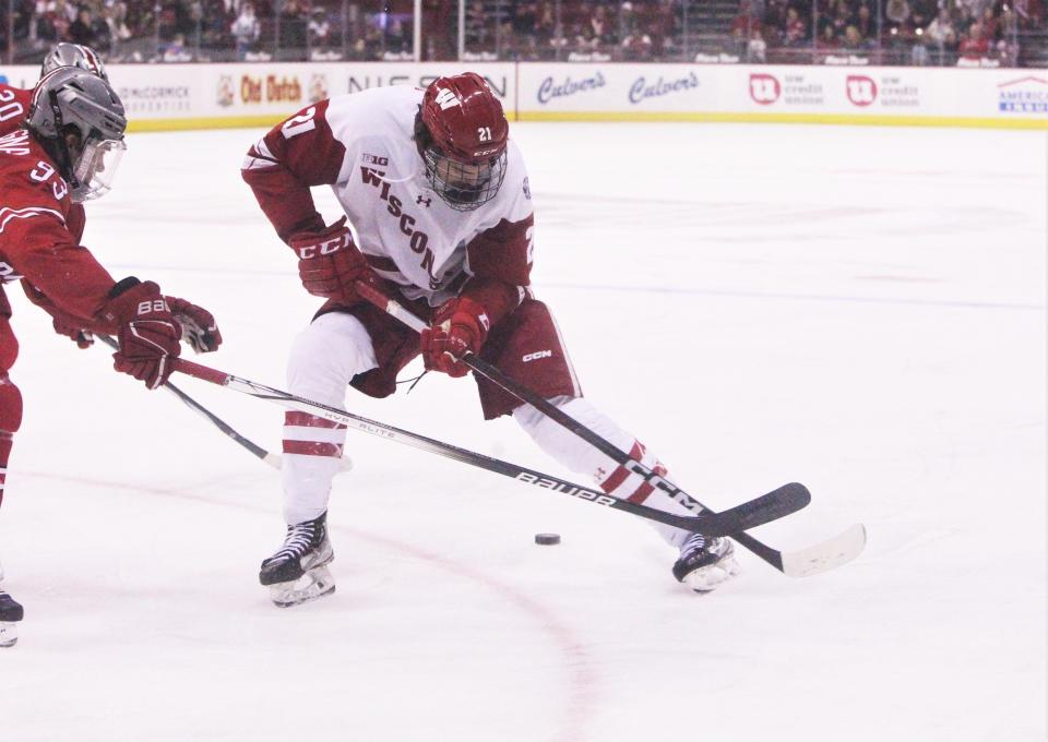 Wisconsin's Carson Bantle handles the puck during the Badgers' Big Ten quarterfinal game against Ohio State on March 10 at the Kohl Center in Madison, Wis.