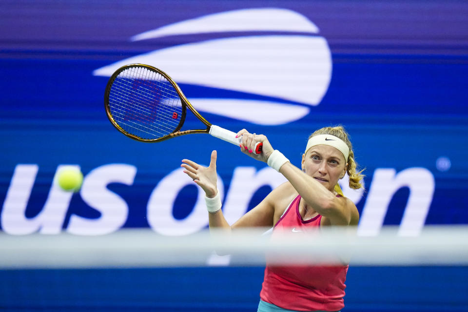 Petra Kvitova, of the Czech Republic, returns a shot to Caroline Wozniacki, of Denmark, during the second round of the U.S. Open tennis championships, Wednesday, Aug. 30, 2023, in New York. (AP Photo/Frank Franklin II)