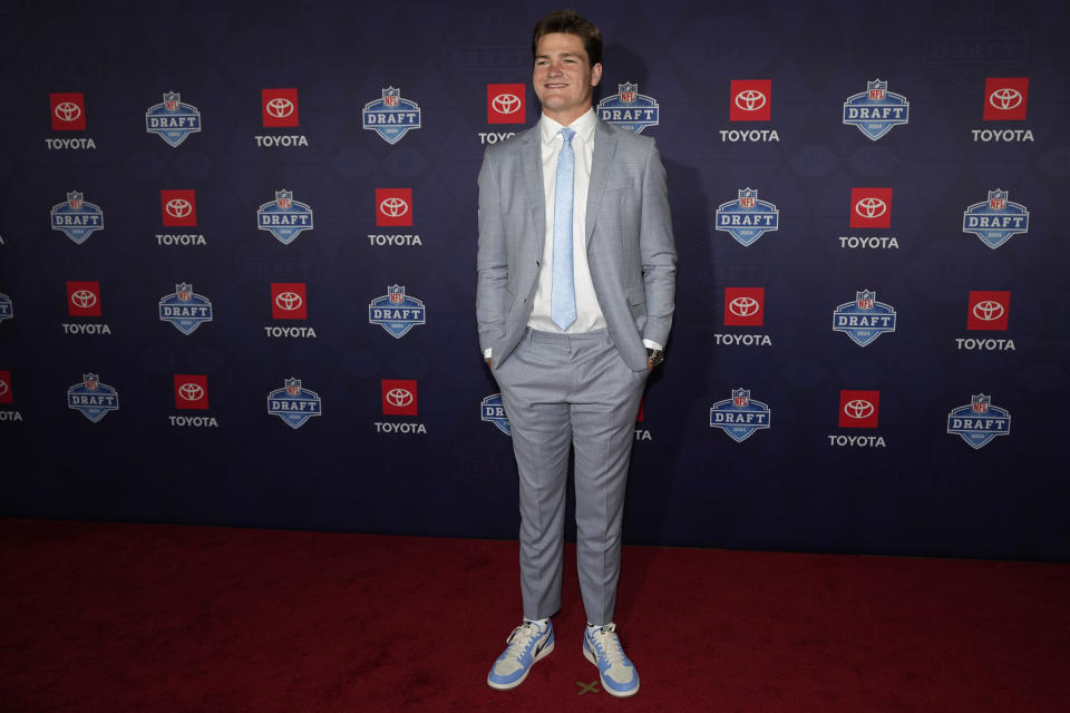 North Carolina quarterback Drake Maye poses on the red carpet ahead of the first round of the NFL football draft, Thursday, April 25, 2024, in Detroit. (AP Photo/Carlos Osorio)