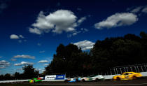 MONTREAL, QC - AUGUST 18: Danica Patrick, driver of the #7 GoDaddy.com Chevrolet, leads the field during the NASCAR Nationwide Series sixth annual NAPA AUTO PARTS 200 presented by Dodge at Circuit Gilles Villeneuve on August 18, 2012 in Montreal, Quebec, Canada. (Photo by Tom Pennington/Getty Images for NASCAR)