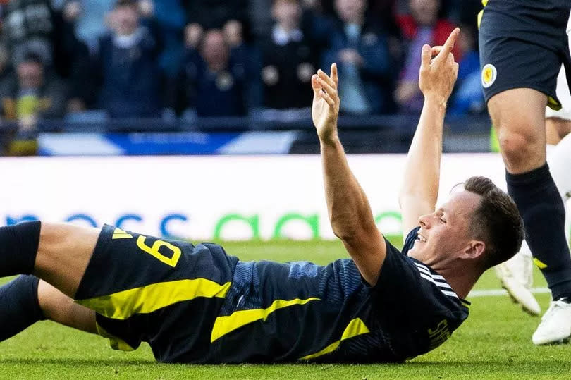 Lawrence Shankland celebrates after scoring to make it 2-0