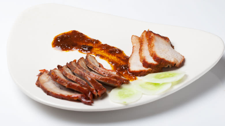 roasted char siu pork white plate