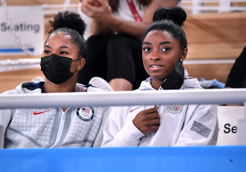 -TOKYO,JAPAN July 29, 2021: USA's Simone Biles, right and Jordan Chiles watch the women's individual all-around final from the seats at the 2020 Tokyo Olympics. (Wally Skalij /Los Angeles Times)