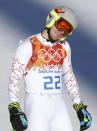 Ted Ligety of the U.S. reacts in the finish area after competing in the downhill run of the men's alpine skiing super combined event during the 2014 Sochi Winter Olympics at the Rosa Khutor Alpine Center in Rosa Khutor February 14, 2014. REUTERS/Leonhard Foeger