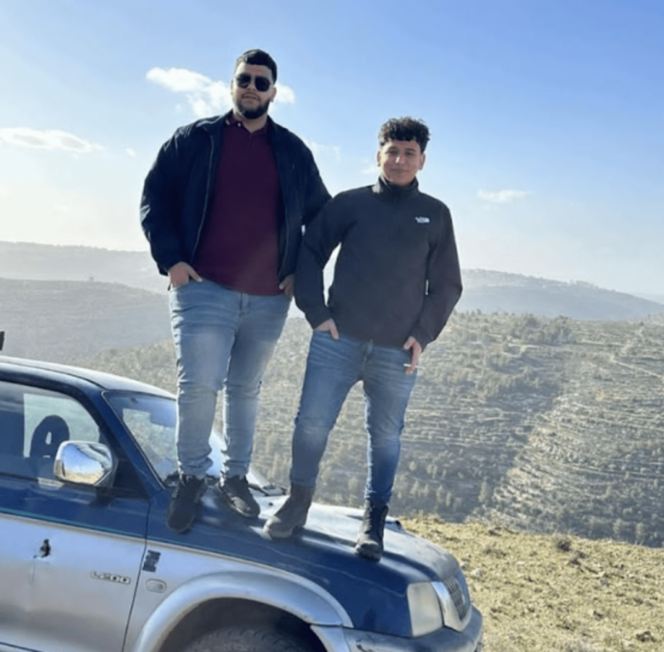 A photo taken earlier this month shows Tawfic and a friend standing on the vehicle and in the location he would later be shot in. (Courtesy Abdel Jabbar family)
