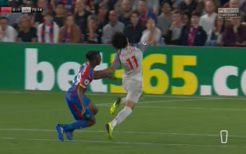 Salah brought down by Wan-Bissaka - Credit: Sky