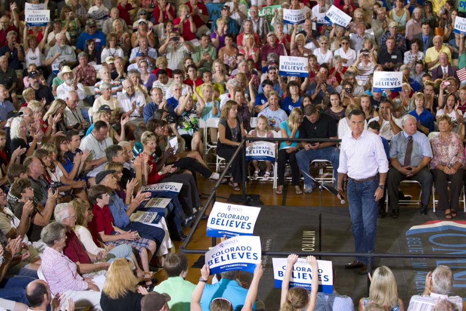 Republican presidential candidate, former Massachusetts Gov. Mitt Romney pauses during a campaign stop at Central High School, Tuesday, July 10, 2012, in Grand Junction, Colo. (AP Photo/Evan Vucci)