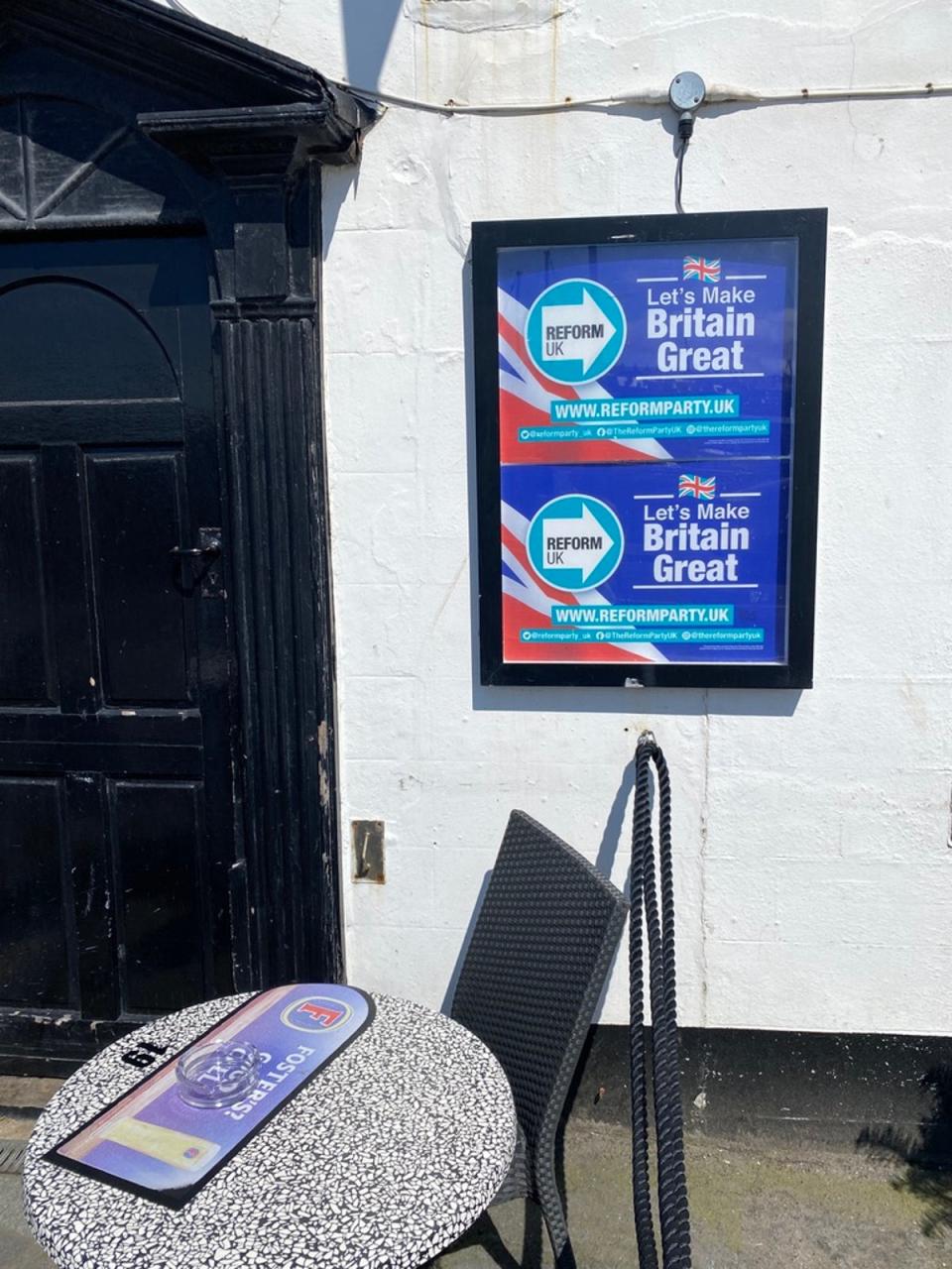 Reform Party poster outside a Whitby pub (Maya Oppenheim)