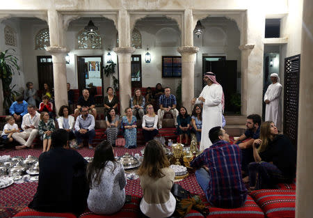 Rashid Al Tamimi, a Senior Cultural Presenter, talks to the foreign visitors and residents in the UAE about Ramadan and Emirati culture during the Muslim holy fasting month of Ramadan, at the Sheikh Mohammed Centre for Cultural Understanding (SMCCU) in Dubai, UAE May 17, 2019. REUTERS/Satish Kumar