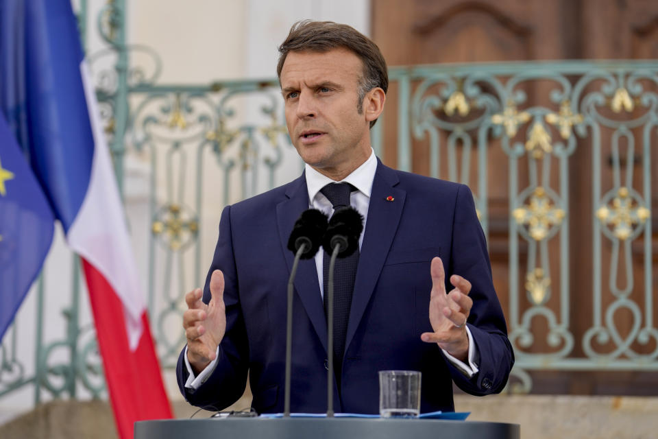 FILE - French President Emmanuel Macron speaks at a news conference at the German government guest house in Meseberg, north of Berlin, Germany, May 28, 2024. A group that monitors for misinformation found deep problems when it tested the most popular artificial intelligence voice-cloning tools and asked them to create audio of some of the world's leading political figures. (AP Photo/Ebrahim Noroozi, File)