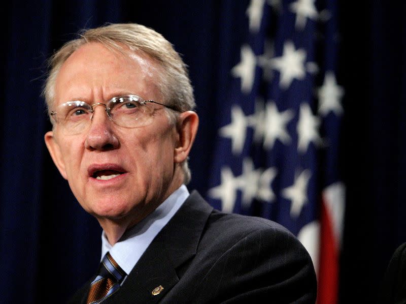 FILE PHOTO: Newly elected Senate Minority Leader Harry Reid holds news conference.