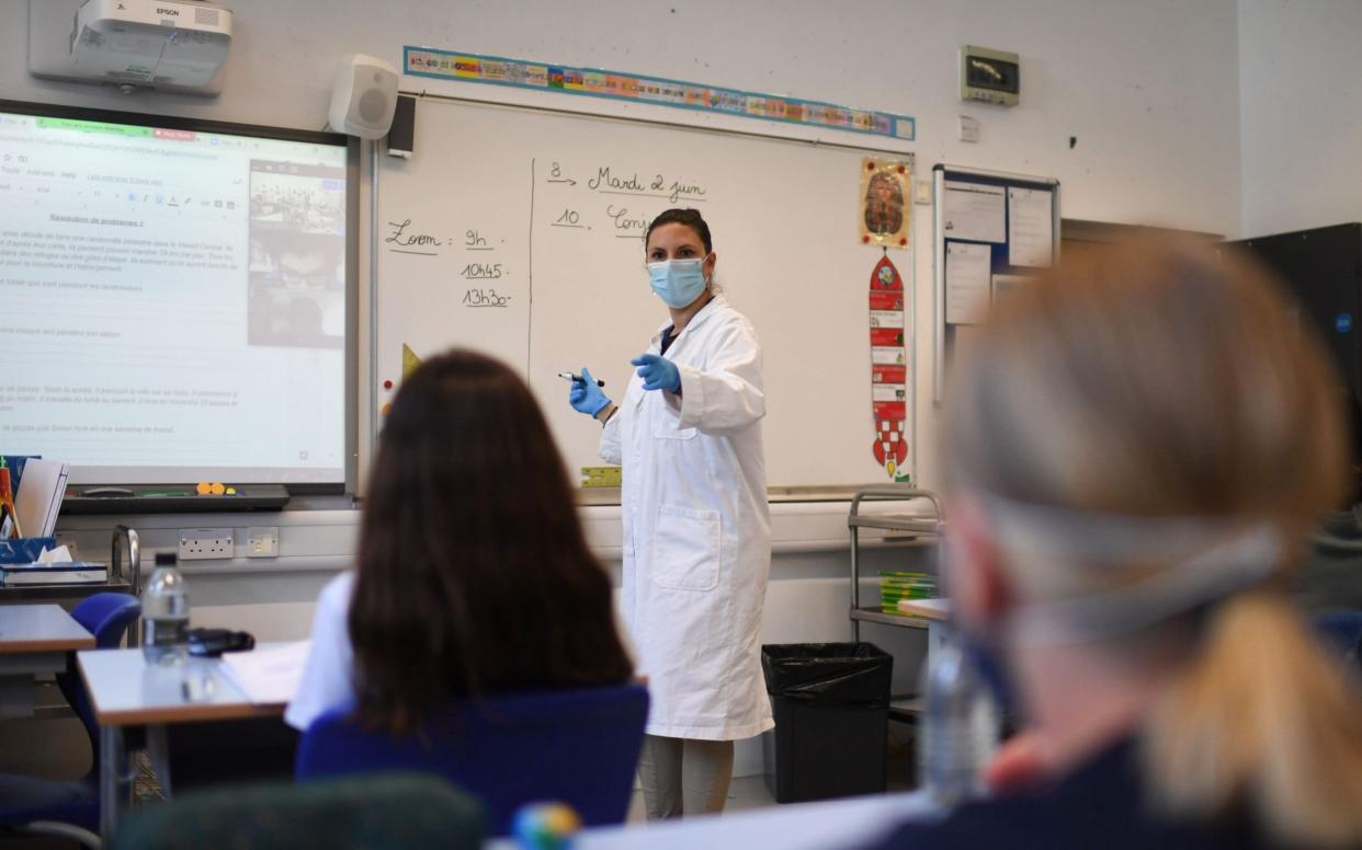 Teacher at the head of the class - Daniel Leal-Olivas/AFP