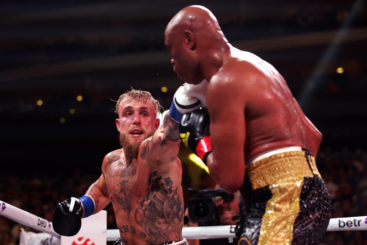 Jake Paul (left) punches Anderson Silva during their cruiserweight bout at Gila River Arena on October 29, 2022 in Glendale, Arizona. (Photo by Christian Petersen/Getty Images)